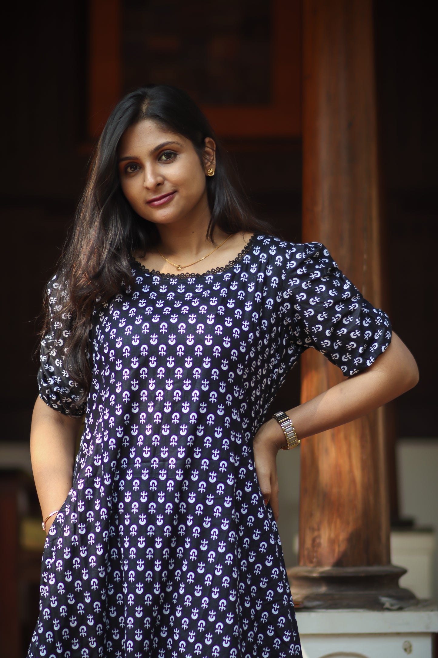 Black floral cotton kurta set with grey striped pant